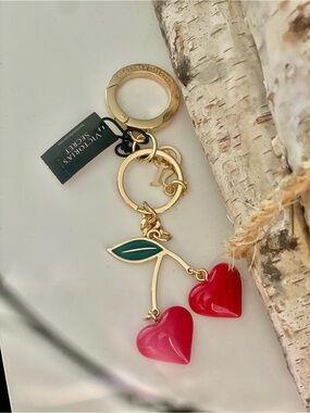 Victoria's Secret Gold Cherry Keychain with Red Heart Charms and Green Leaf
